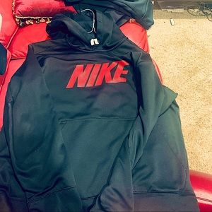 Used black Nike Sweatshirt with red lettering. XL